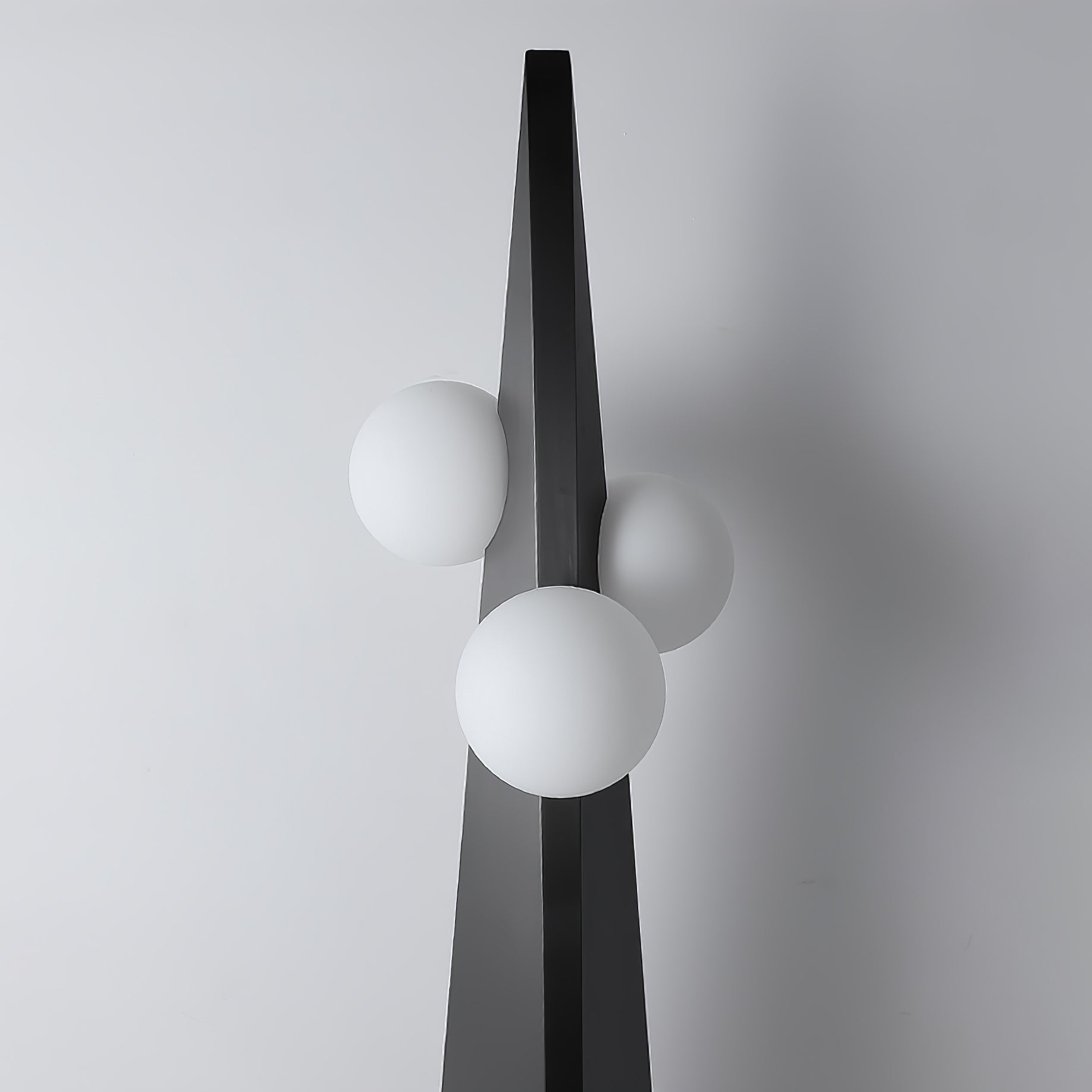 Geometric Stainless Steel Floor Lamp with Spherical Glass Shade in Black Finish