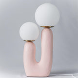 modern-resin-globe-table-lamp-with-sculptural-base-for-designer-home-decor