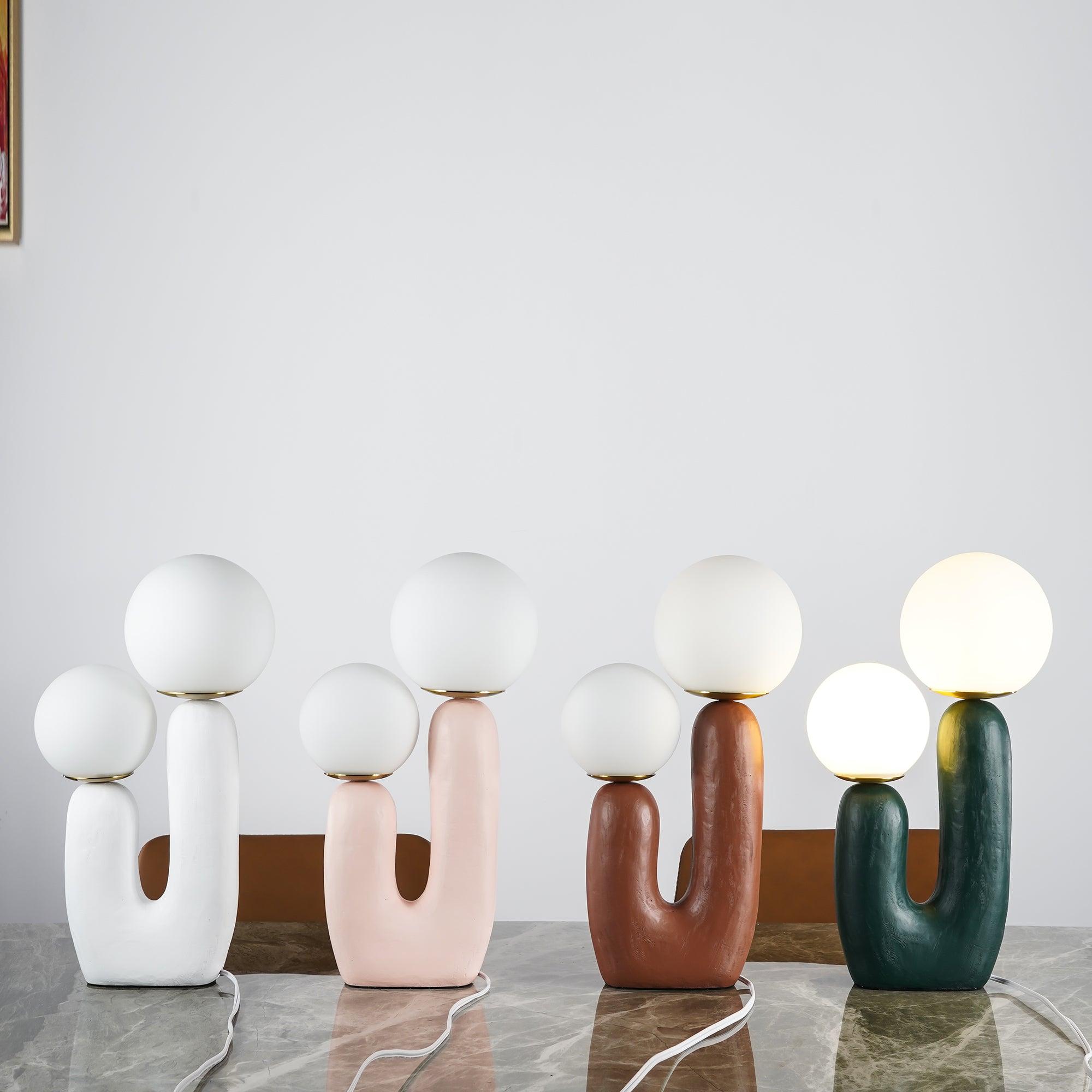 modern-resin-globe-table-lamp-with-sculptural-base-for-designer-home-decor