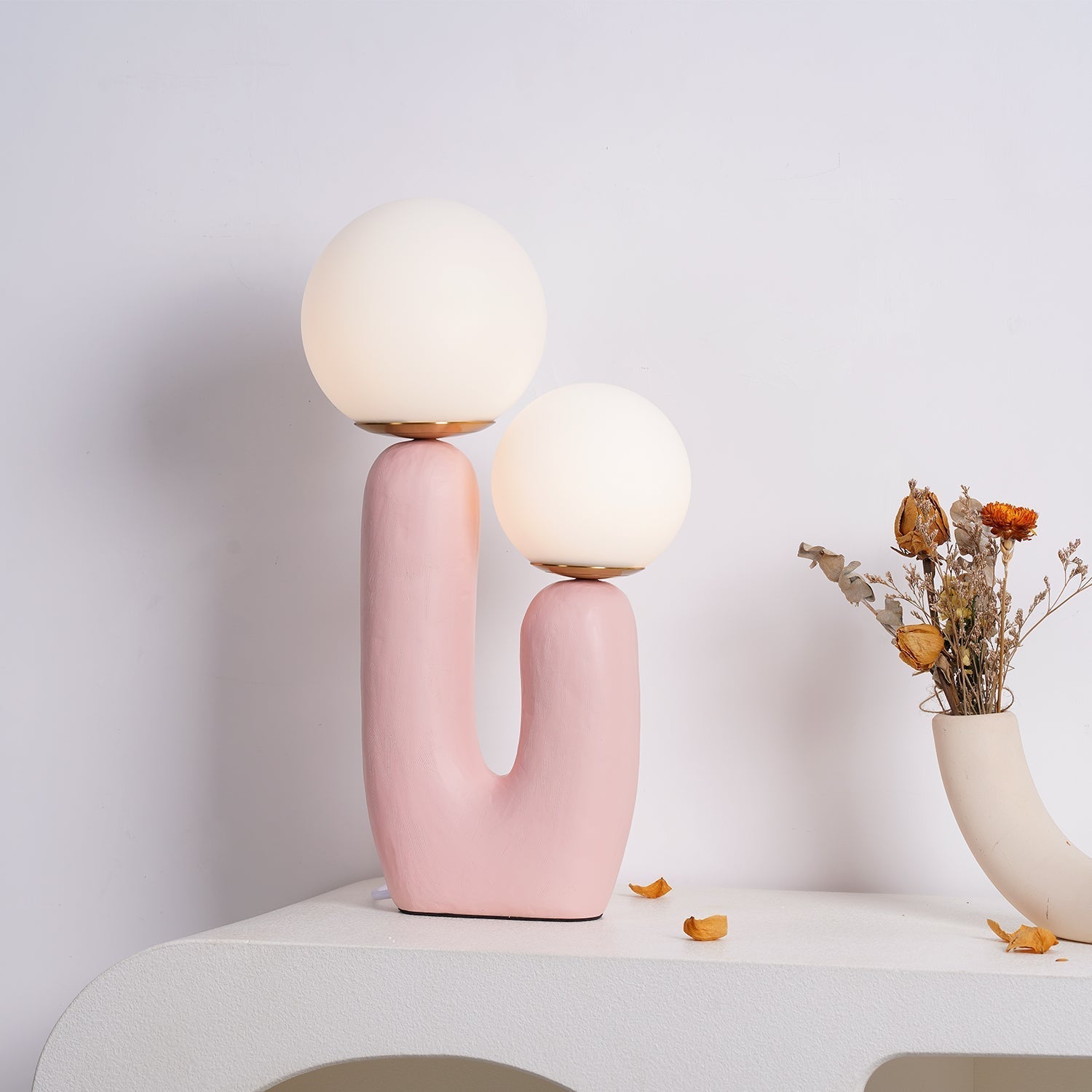 modern-resin-globe-table-lamp-with-sculptural-base-for-designer-home-decor