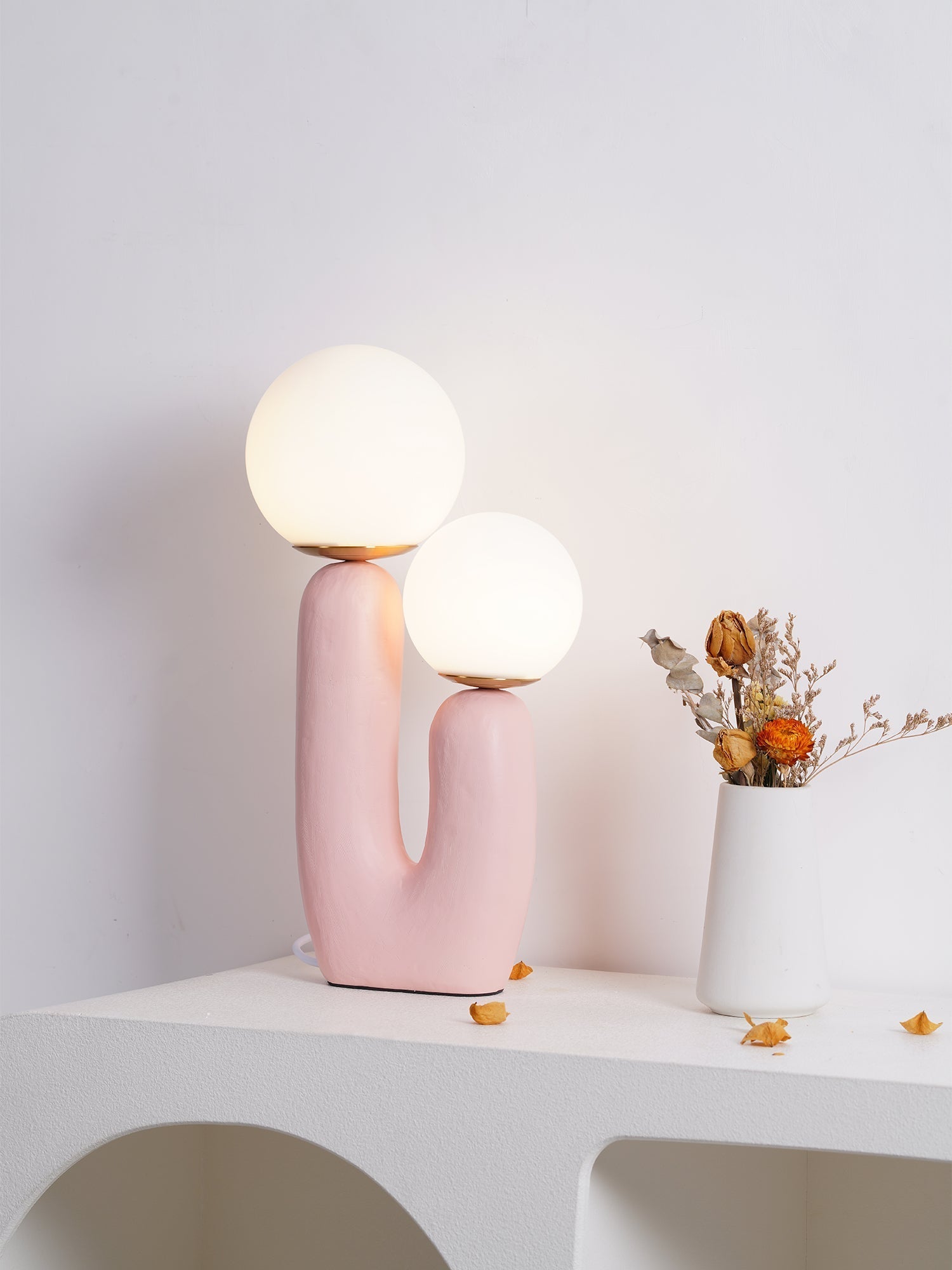 modern-resin-globe-table-lamp-with-sculptural-base-for-designer-home-decor