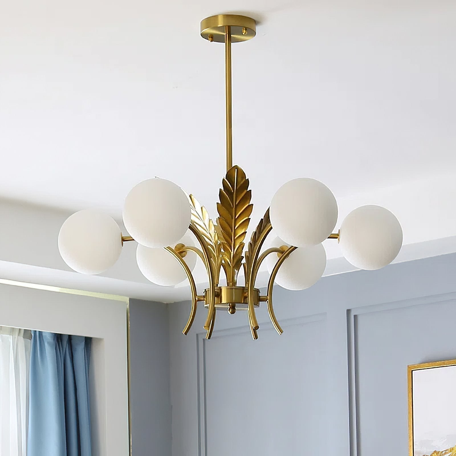 modern-ophelia-glass-globe-chandelier-with-wrought-iron-and-feather-detail-in-antique-gold