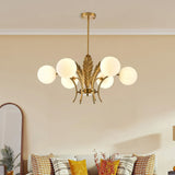 modern-ophelia-glass-globe-chandelier-with-wrought-iron-and-feather-detail-in-antique-gold