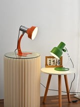 stylish-orange-and-chrome-metal-bedside-lamp-with-vibrant-apple-green-wire