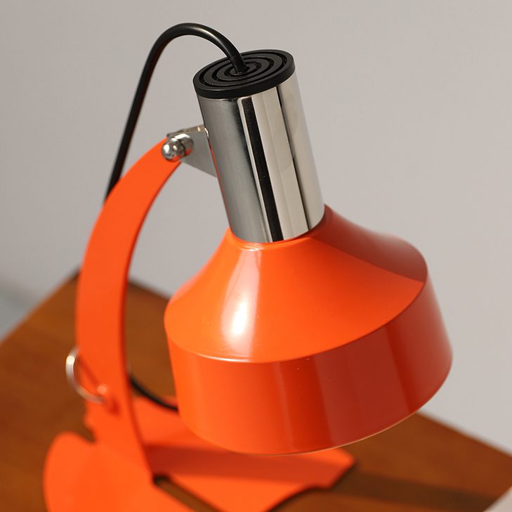 stylish-orange-and-chrome-metal-bedside-lamp-with-vibrant-apple-green-wire