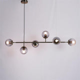 contemporary-multi-glass-globe-pendant-light-with-round-orb-shades-and-polished-brass-frame