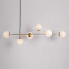 contemporary-multi-glass-globe-pendant-light-with-round-orb-shades-and-polished-brass-frame