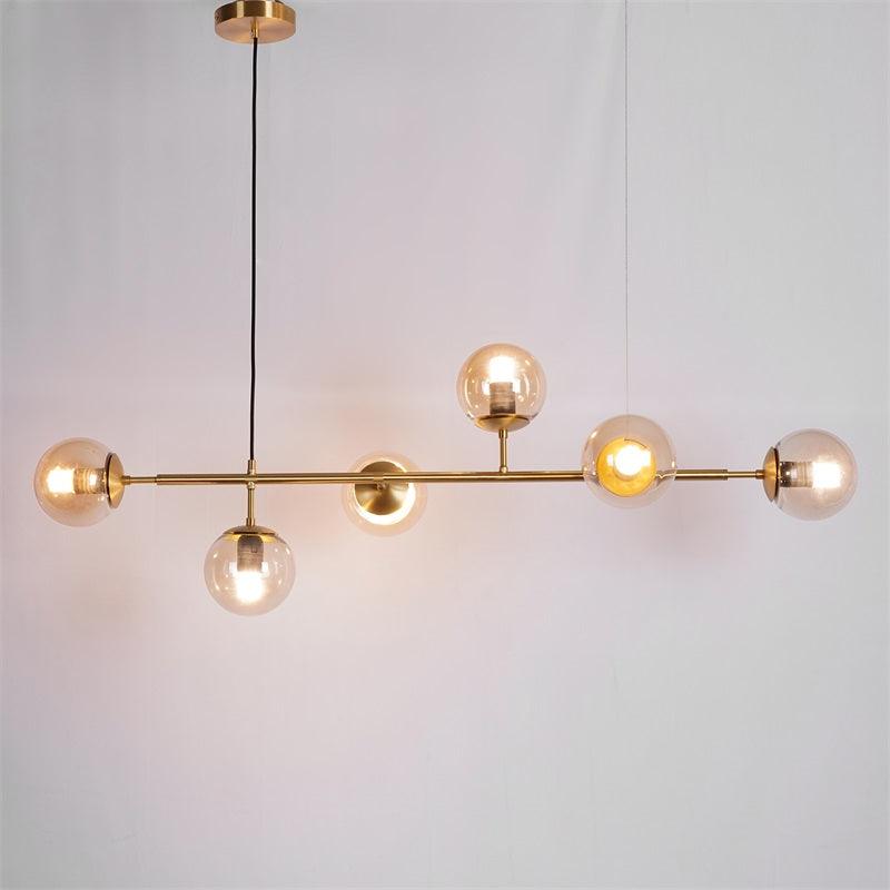 contemporary-multi-glass-globe-pendant-light-with-round-orb-shades-and-polished-brass-frame