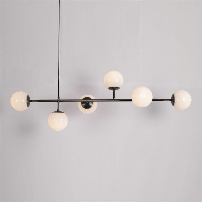 contemporary-multi-glass-globe-pendant-light-with-round-orb-shades-and-polished-brass-frame