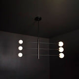 modern-orbital-3-arm-articulated-glass-globe-chandelier-in-copper-and-bronze-finish
