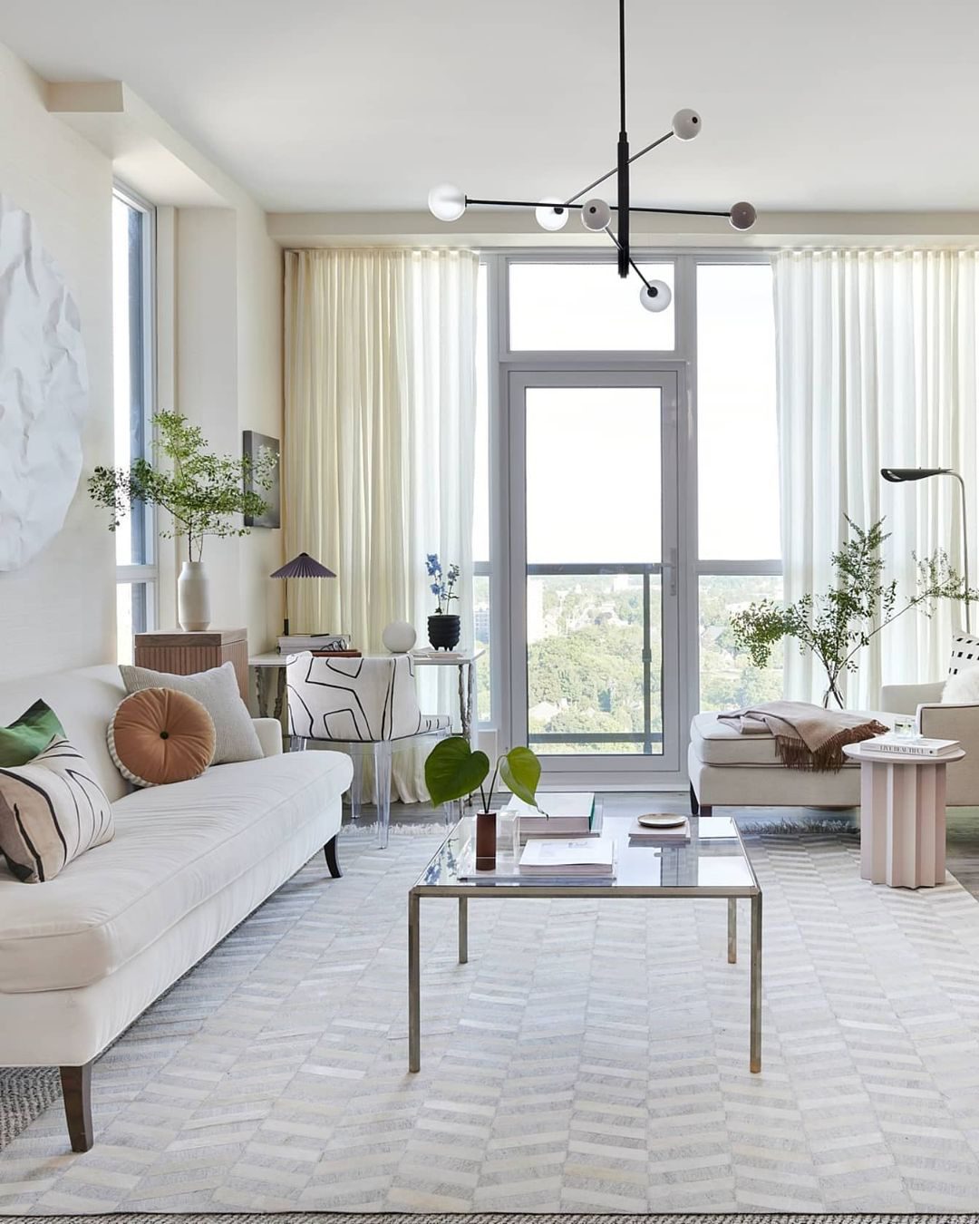 modern-orbital-3-arm-articulated-glass-globe-chandelier-in-copper-and-bronze-finish
