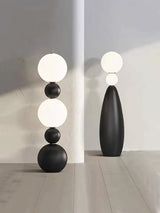 Modern Orion Sphere Floor Lamp Minimalist Black and White Glass Globe Standing Light