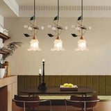 floral-glass-pendant-light-with-crystal-accents-and-pastoral-flower-design