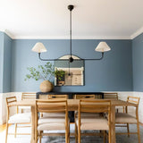 modern-piaf-brass-chandelier-with-white-fabric-shades-for-elegant-home-interior-lighting