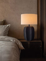 handcrafted-black-geometric-ceramic-table-lamp-with-white-fabric-shade-for-modern-living-room