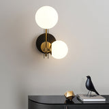 modern-minimalist-glass-globe-wall-sconce-brass-and-black-planeta-wall-lamp