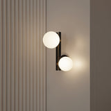 modern-minimalist-glass-globe-wall-sconce-brass-and-black-planeta-wall-lamp