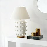 Elegant White Polka Dot Porcelain Table Lamp with Fabric Shade and Brass Base