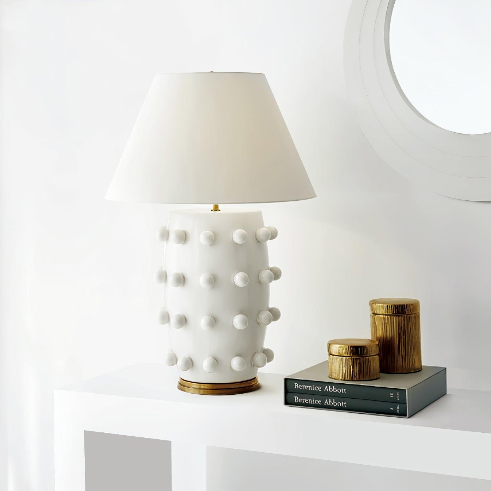 Elegant White Polka Dot Porcelain Table Lamp with Fabric Shade and Brass Base