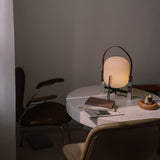 Modern Portable Lantern Table Lamp with Leather Handle and Opal Glass Globe for Bedside Lighting