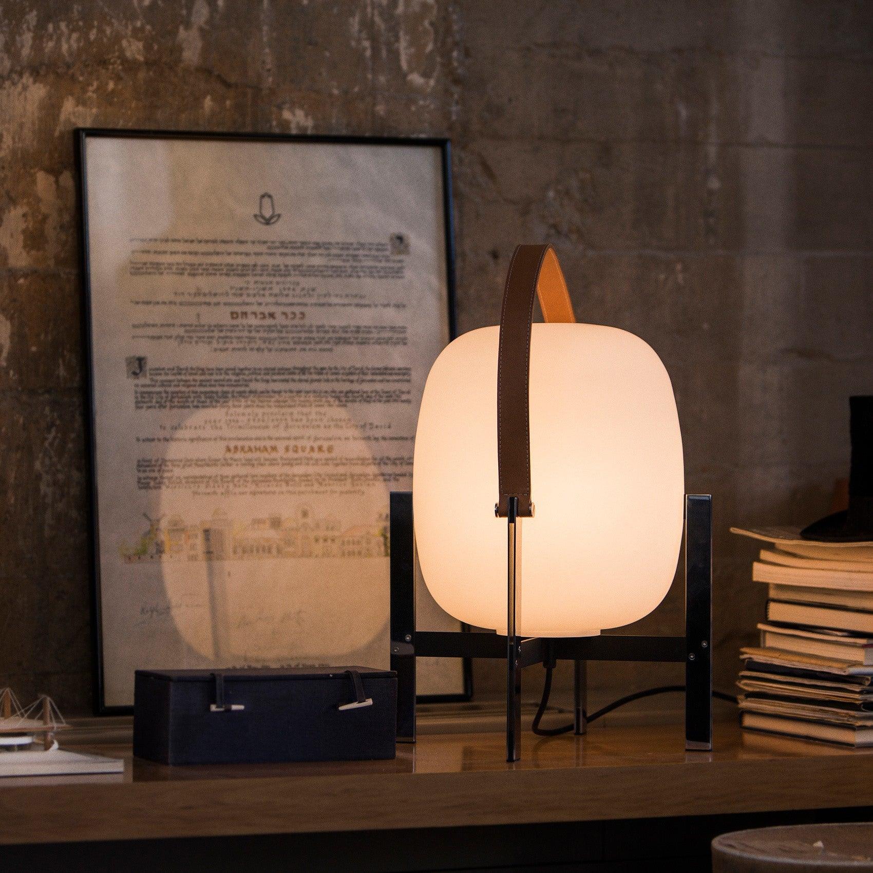 Modern Portable Lantern Table Lamp with Leather Handle and Opal Glass Globe for Bedside Lighting