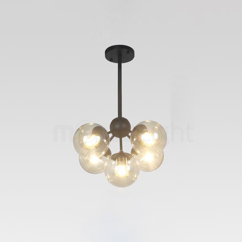 modern-black-geometric-chandelier-with-cognac-glass-globes-for-mid-century-living-spaces