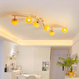 modern-pumpkin-resin-multi-head-ceiling-light-fixture-for-dining-and-living-rooms