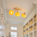 modern-pumpkin-resin-multi-head-ceiling-light-fixture-for-dining-and-living-rooms