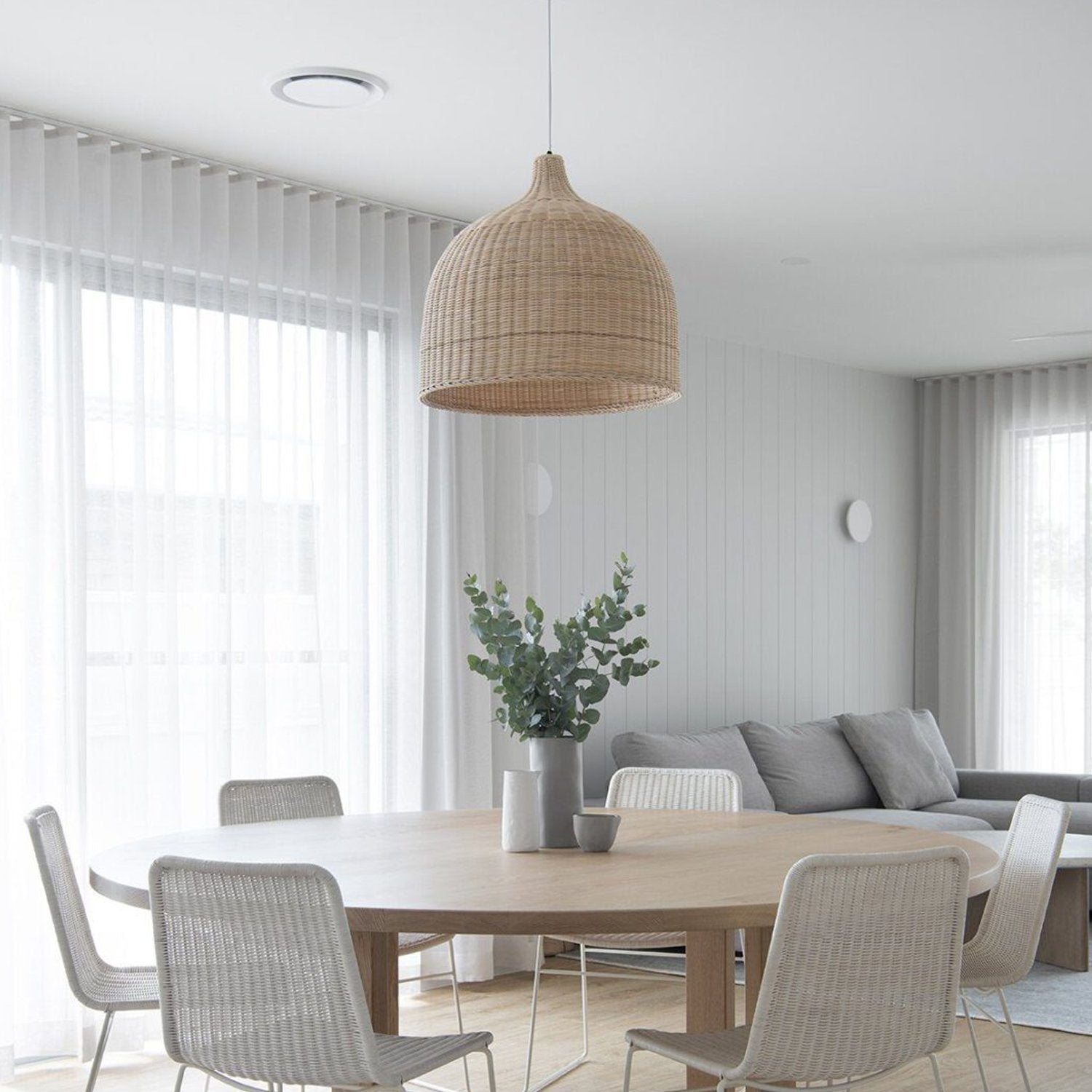 handwoven-natural-rattan-globe-pendant-lamp-for-coastal-and-bohemian-living-spaces