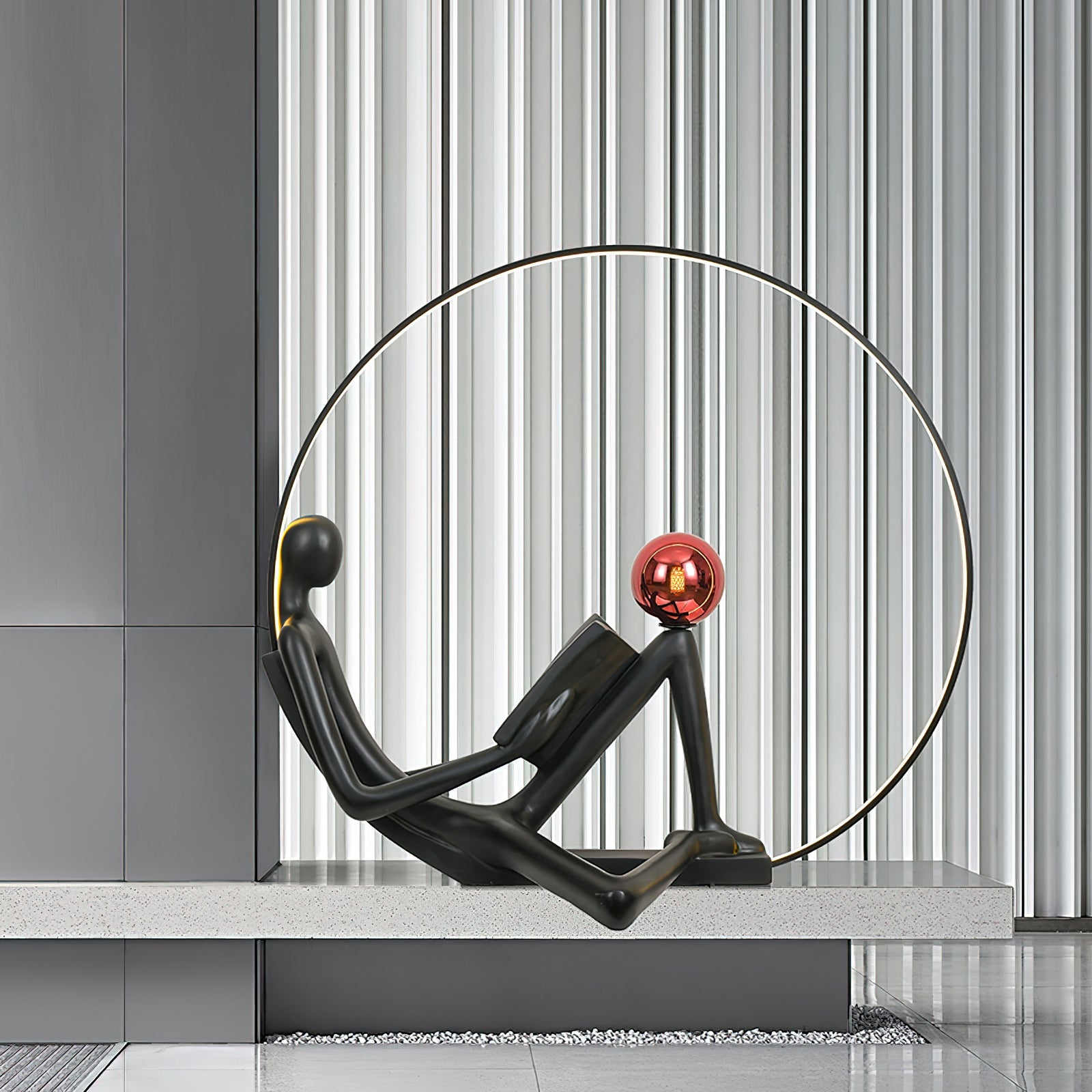 Modern Figurative Reader Sculpture LED Floor Lamp with Circular Frame and Ambient Lighting