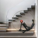 Modern Figurative Reader Sculpture LED Floor Lamp with Circular Frame and Ambient Lighting