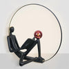 Modern Figurative Reader Sculpture LED Floor Lamp with Circular Frame and Ambient Lighting
