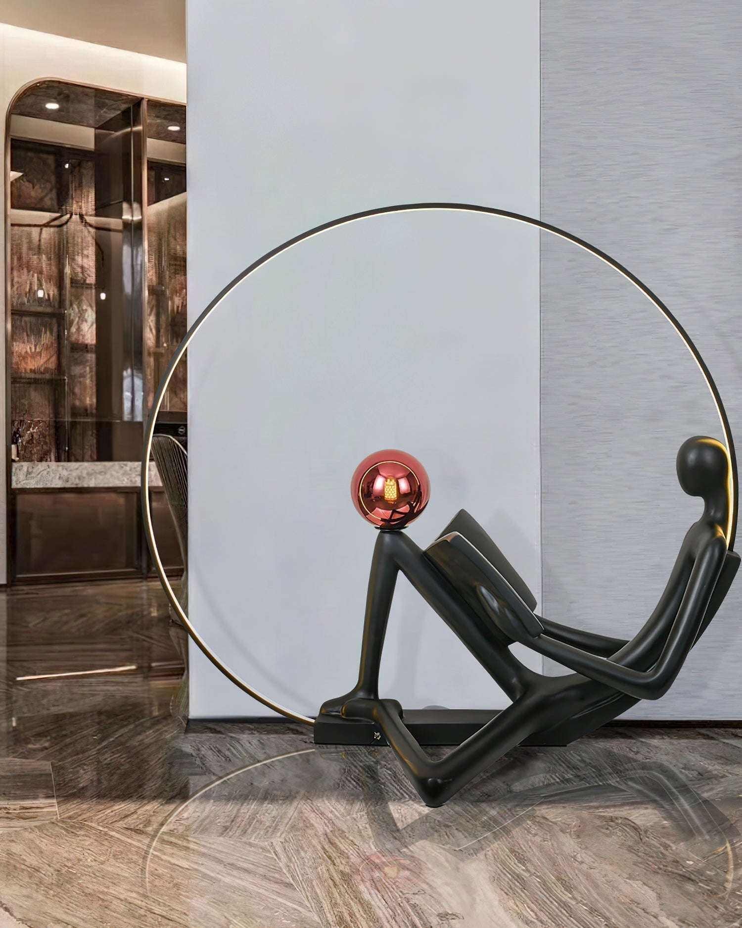Modern Figurative Reader Sculpture LED Floor Lamp with Circular Frame and Ambient Lighting