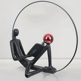 Modern Figurative Reader Sculpture LED Floor Lamp with Circular Frame and Ambient Lighting