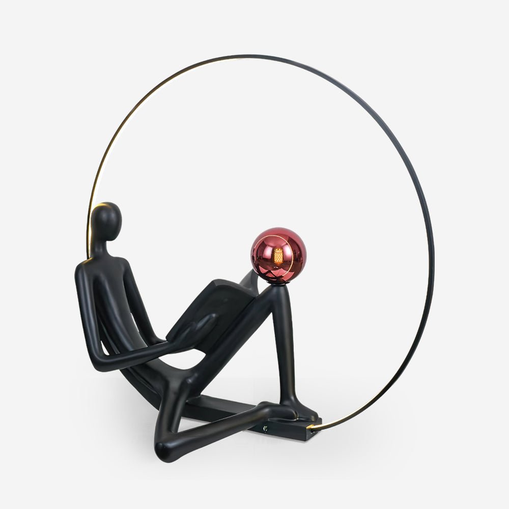 Modern Figurative Reader Sculpture LED Floor Lamp with Circular Frame and Ambient Lighting