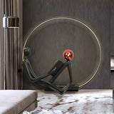 Modern Figurative Reader Sculpture LED Floor Lamp with Circular Frame and Ambient Lighting