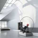 Modern Figurative Reader Sculpture LED Floor Lamp with Circular Frame and Ambient Lighting