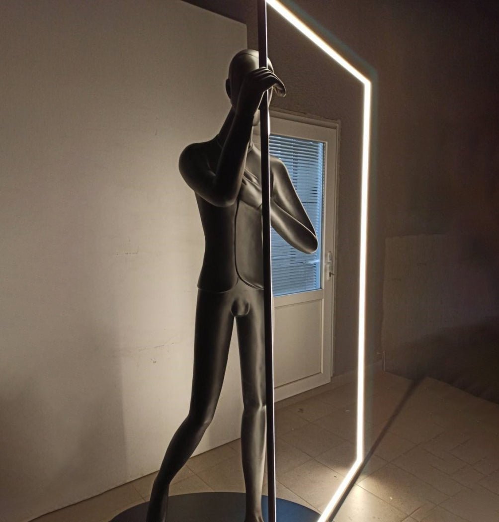 modern-figurative-sculpture-floor-lamp-with-integrated-mirror-and-led-lighting-for-artistic-interiors