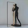 modern-figurative-sculpture-floor-lamp-with-integrated-mirror-and-led-lighting-for-artistic-interiors