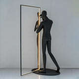 modern-figurative-sculpture-floor-lamp-with-integrated-mirror-and-led-lighting-for-artistic-interiors