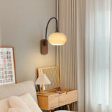 elegant-walnut-wood-wall-lamp-with-white-glass-globe-shade-for-indoor-lighting