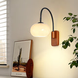 elegant-walnut-wood-wall-lamp-with-white-glass-globe-shade-for-indoor-lighting