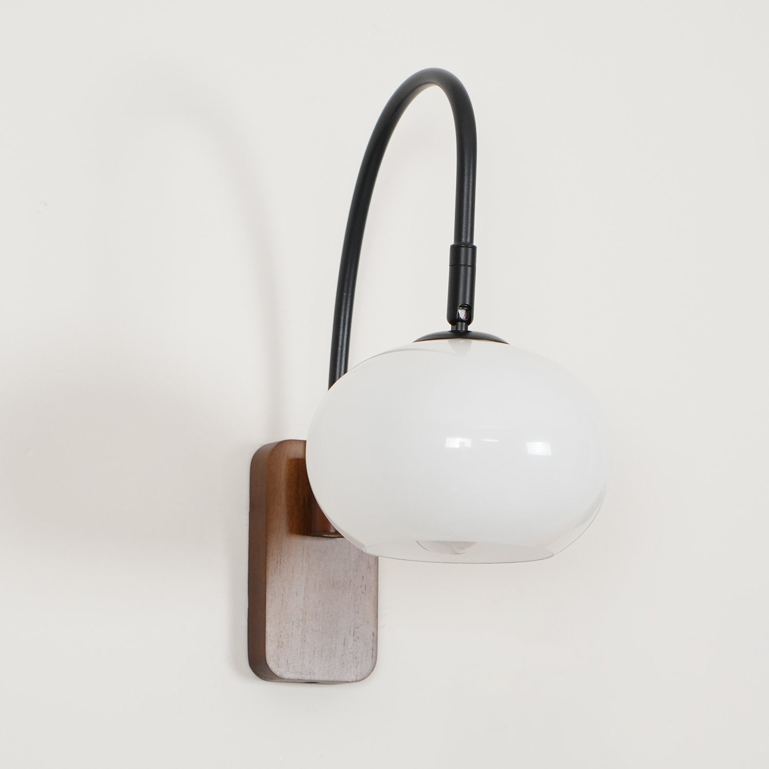 elegant-walnut-wood-wall-lamp-with-white-glass-globe-shade-for-indoor-lighting