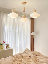 modern-ribbed-rubberwood-chandelier-with-white-glass-globes-and-gold-accents