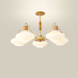 modern-ribbed-rubberwood-chandelier-with-white-glass-globes-and-gold-accents