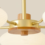modern-ribbed-rubberwood-chandelier-with-white-glass-globes-and-gold-accents