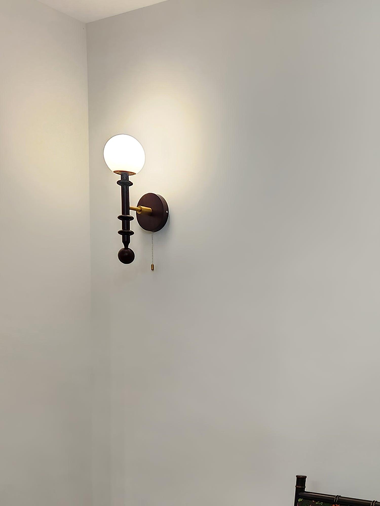 vintage-roman-column-wall-sconce-with-walnut-wood-accents-and-glass-shade-for-indoor-lighting