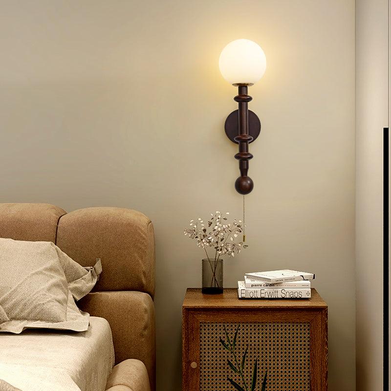 vintage-roman-column-wall-sconce-with-walnut-wood-accents-and-glass-shade-for-indoor-lighting