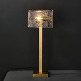 Roosevelt Modern Gold Brass Table Lamp with Clear Glass Shade and Minimalist Design