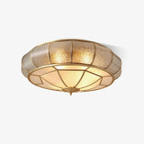 Modern Brass Flush Mount Ceiling Light with Textured Glass Shade for Indoor Spaces